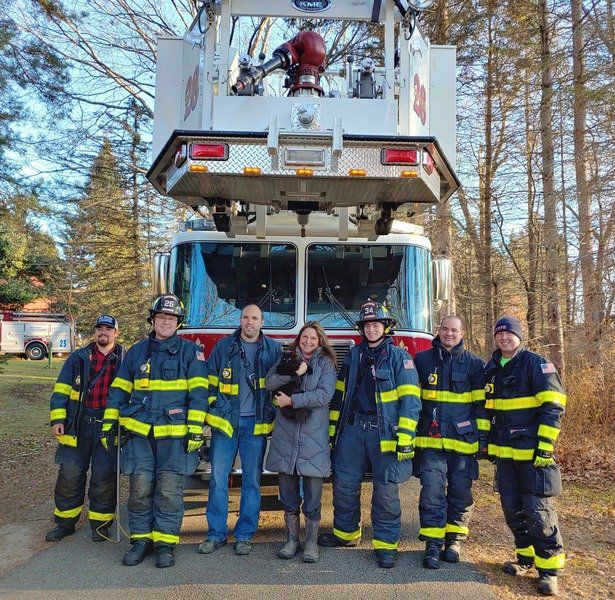 West Newbury firefighters help a feline in need